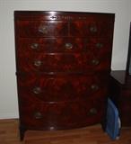 Flame mahogany chest of drawers.  Seven piece set.