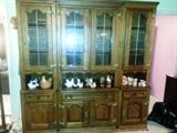 Three piece vintage walnut china cabinet in excellent condition . Available pre sale $300