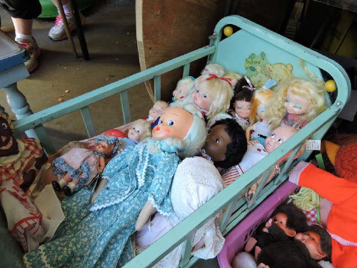 dolls and antique doll cradle.