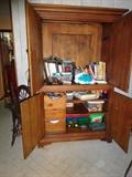 Photo 2 of 2: A wooden entertainment center with plenty of storage space.