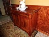 An old fashioned antique sideboard.
