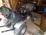 Photo 1 of 2: A riding lawn mower with a plow attachment.  Perfect for when it snows!  Sold as a set only!