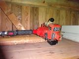 A weed wacker for taking care of the lawn.