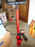 A red bicycle pump