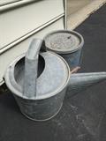 A metal watering can