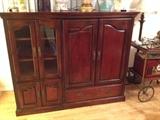 Short Mahogany finish entertainment/storage unit