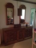 Dresser and mirrors match king headboard