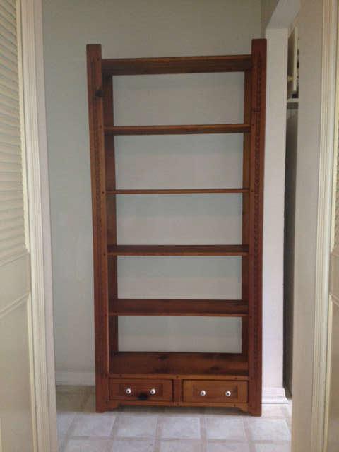 Shelving Unit with carved uprights