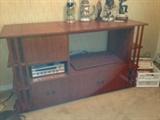 Mahogany short entertainment unit.  Both open portions have drop down doors