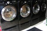 TWO sets of black LG Front Loading Washers and Dryers with drawer pedestal. Used approx. 3 1/2 years