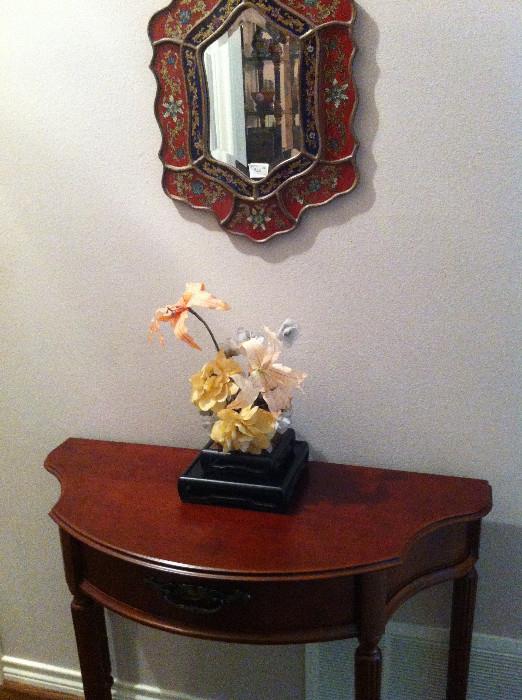                     small entry table; Asian mirror 