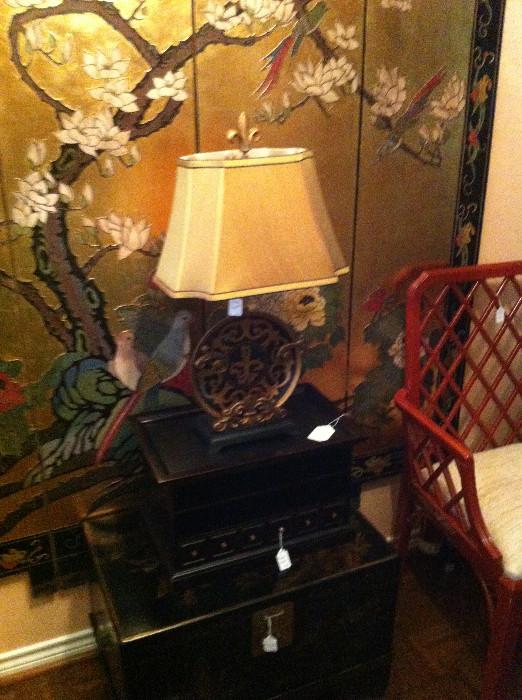                  Asian boxes, lamp, screen; red chair