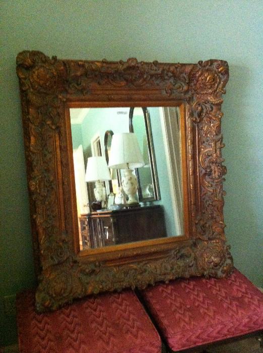              decorative mirror; matching benches