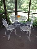Metal Table and 4 Ice Cream Parlor Style chairs.