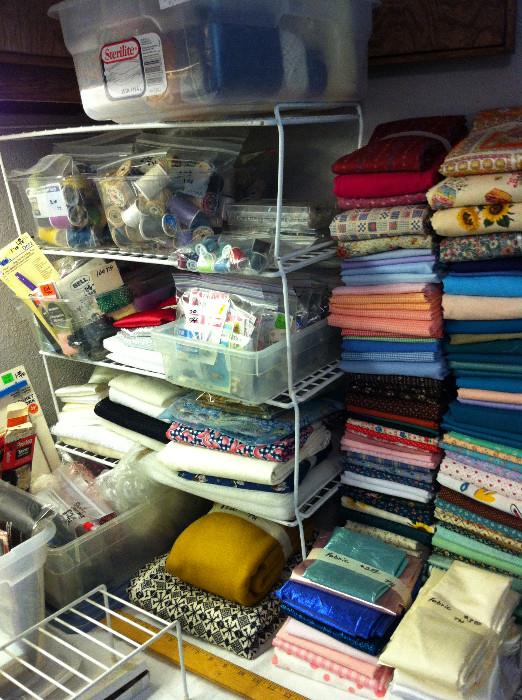       so much fabric; abundance of sewing notions