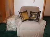 Recliner and an assortment of pillows