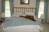 King size bed with brass head board