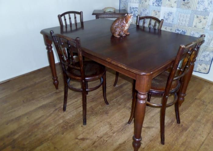 antique walnut table and four chairs