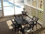 Metal outdoor table and chairs....lots of pool furniture, etc..