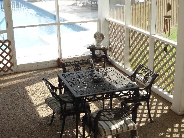 Metal outdoor table and chairs....lots of pool furniture, etc..