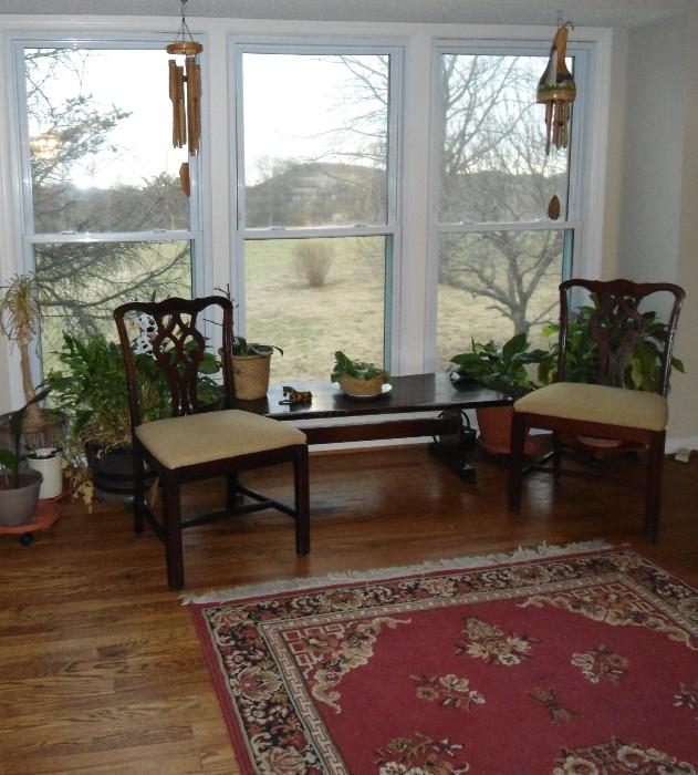 Area Rug. Live plants, coffee table, chairs, floor lamps, lamps, prints, decorating items for the home.