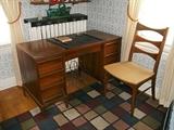 Danish style desk and Lane midcentury dining chair.
