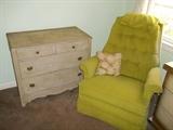 Antique (and antiqued) chest and La-Z-Boy chartreuse recliner with chenille-like upholstery.
