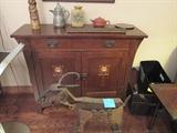 Marked STICKLEY Oak cabinet in excellent condition with drawer, inlaid motif, bronze hardware, cute form. 