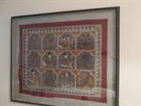 Fine Art . . . . this is embroidered silk with gold threads.  Magical and beautifully framed.