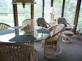 BAMBOO TABLE W/GLASS TOP AND 4 CHAIRS ON WHEELS
