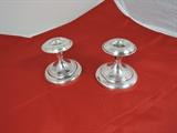Sterling candlestick holders.