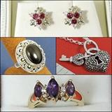 Ruby and diamond earrings set in yellow gold. Black onyx and sterling silver ring. Sterling silver and marcasite heart and key pendant. Diamond and marquise amethyst ring in yellow gold.