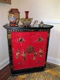 Lacquer Finish Chinese Cabinet with Oriental Pottery Pieces 