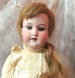 Bisque Young Girl Doll with original wig and dress
