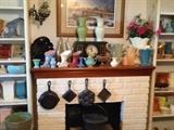 Red Wing pottery and cast iron pans with mantel clock