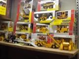 Joal scale model construction equipment in basement
