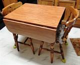 Solid wood drop leaf kitchen table / 2 chairs $ 140.00