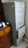 Tall file cabinet $ 80.00