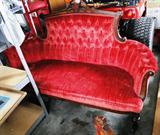 Antique Victorian red velvet sofa $ 200.00 (small piece of trim on bottom missing)