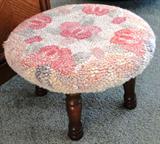 Upholstered footstool $ 16.00