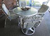 Outdoor table / 4 chairs (2 of which are swivel) $ 100.00