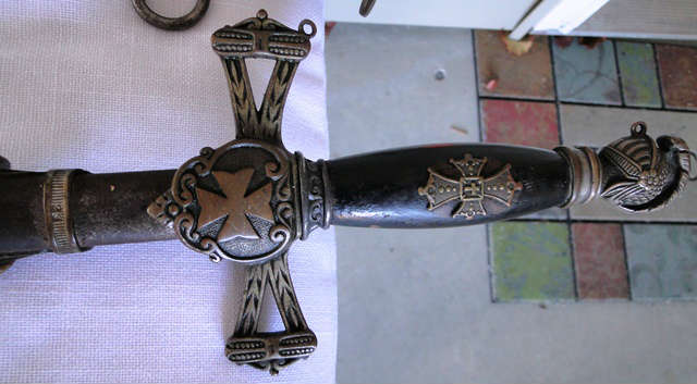 Vintage swords - prices available at sale.