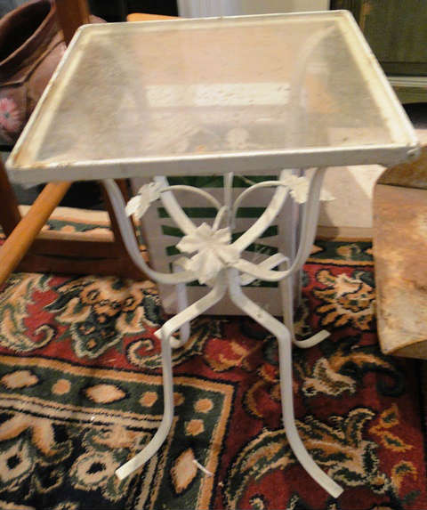 Glass top metal plant stand $ 30.00