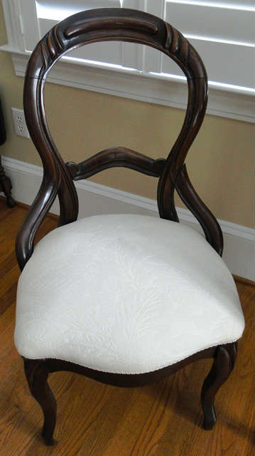 Pair of antique wooden upholstered chairs $ 120.00 each.