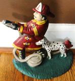 Metal fireman doorstop $ 60.00