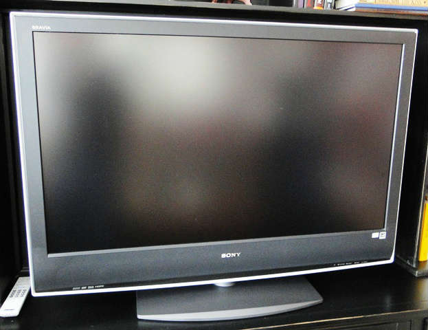 Sony Bravia flat screen TV - 52" $ 400.00