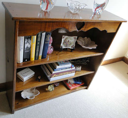 Low solid wood bookcase $ 80.00