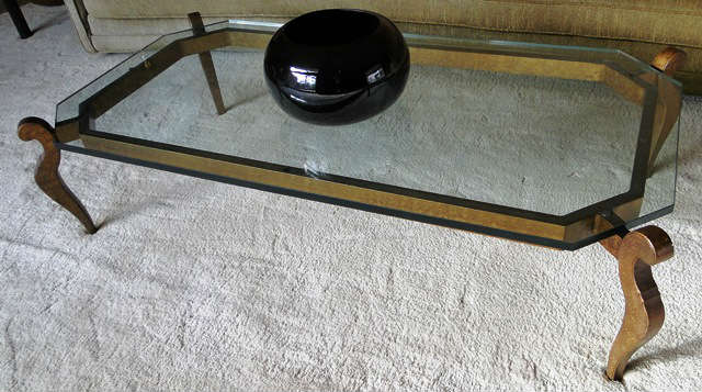 Glass top coffee table $ 300.00  SOLD