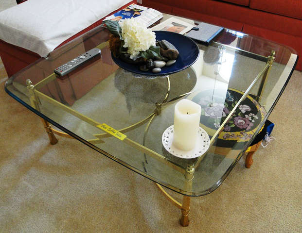 Glass top table. $ 60.00