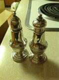 Sterling silver salt / pepper shaker set $ 50.00